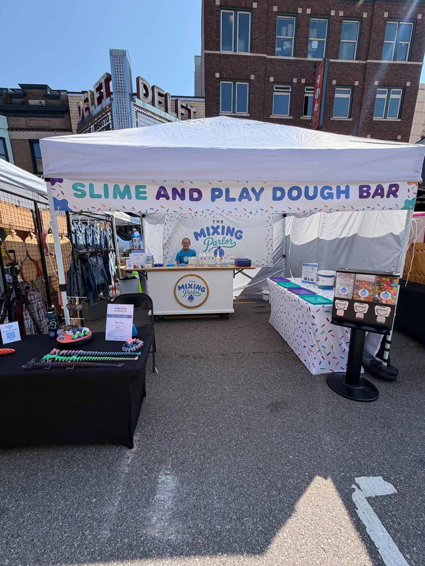 Wide view of the mixing bar booth on a market day